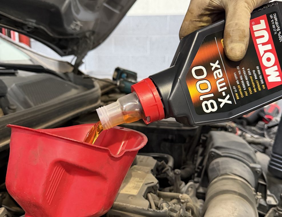 Motul oil change being poured