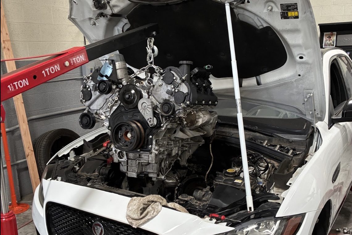 Jaguar F-Pace with engine on hoist